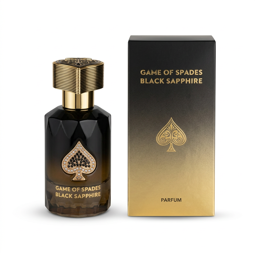 Game Of Spades Black Sapphire faceted perfume bottle beside matching black-and-gold retail box on white
