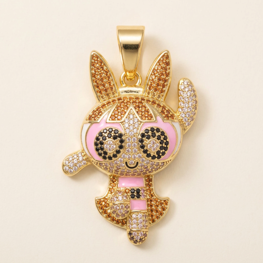 Close-up of gold-tone sparkling character pendant on a neutral background