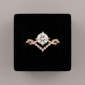 Round clear stone ring with V-shaped sparkling accents