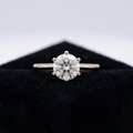 Round clear stone solitaire ring with slim band